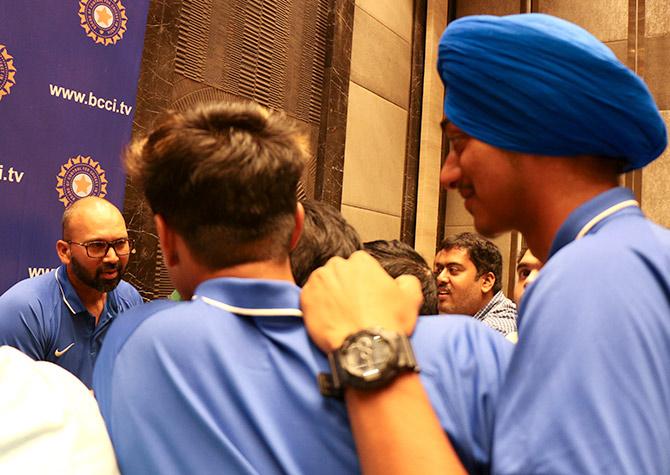 India Under-19 all-rounder Abhishek Sharma interrupts a media session to 'interview' bowling coach Paras Mhambrey