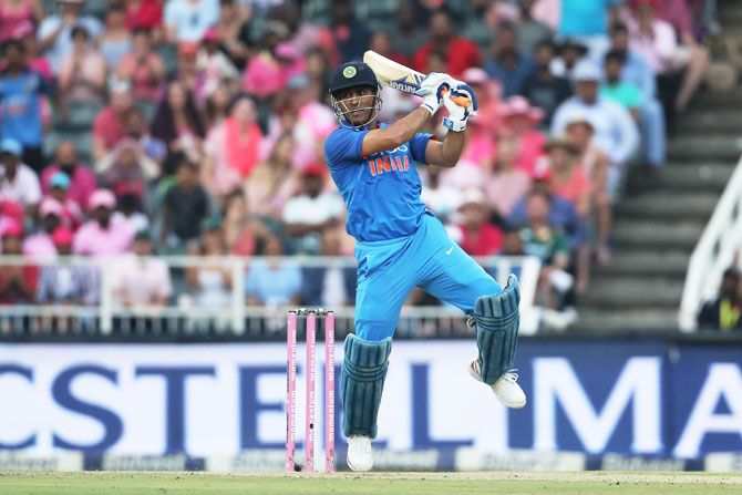 Mahendra Singh Dhoni goes after the bowling as he scores 42 not out