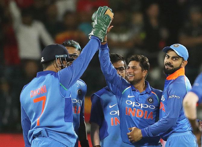 Kuldeep Yadav celebrates the wicket of Tabraiz Shamsi in the 5th ODI