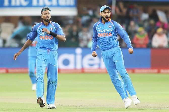 Virat Kohli and Hardik Pandya celebrate the wicket of Jean-Paul Duminy during the 5th ODI in Port Elizabeth on Tuesday