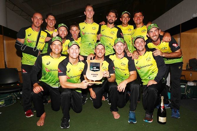 Australia's players celebrate after beating New Zealand