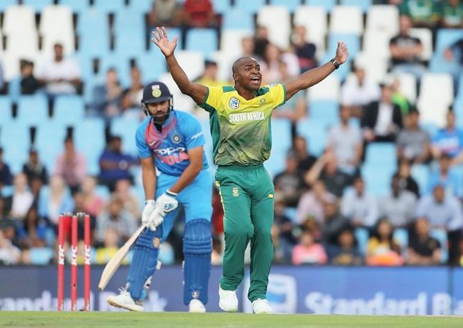 Rohit Sharma watches anxiously as South Africa pacer Junior Dala appeals for lbw.