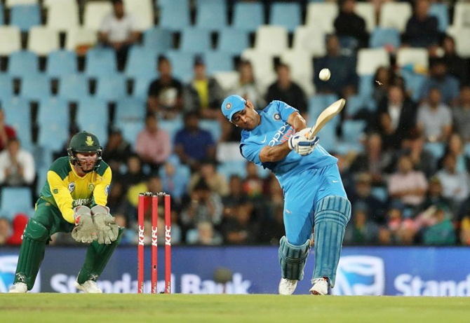 Mahendra Singh Dhoni hoists one over the boundary