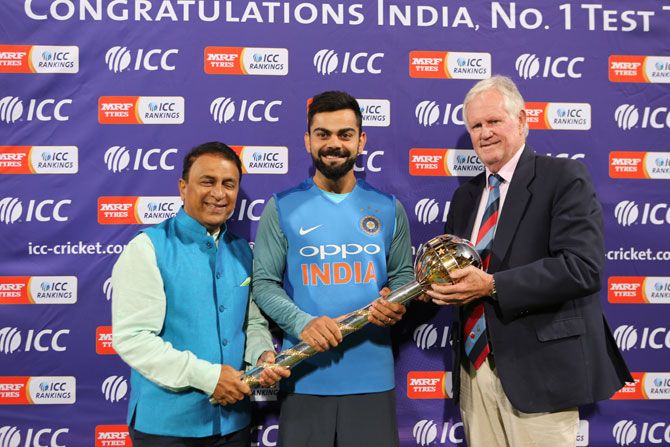 India captain Virat Kohli receives the Test mace from Sunil Gavaskar and Greame Pollock on Saturday