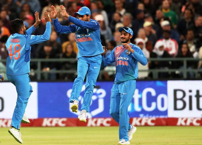 Raina celebrates taking David Miller's wicket in the T20 games against South Africa at Newlands, February 25, 2018.