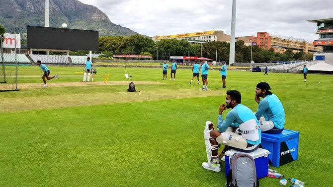 India openers Murali Vijay and KL Rahul watch on during a nets session at Newlands in Cape Town on Wednesday