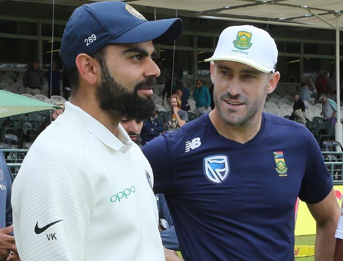 South Africa captain Faf du Plessis, right, with India skipper Virat Kohli after the first Test at Newlands, Cape Town on Monday