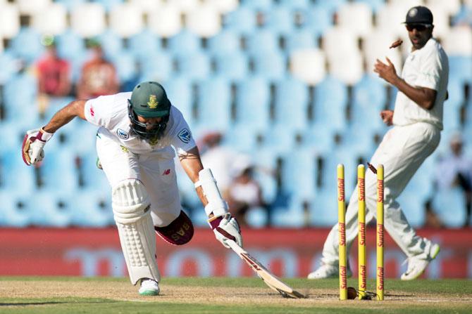 Hashim Amla is run-out by a brilliant pick-up and throw by Hardik Pandya (not pictured) off his own bowling