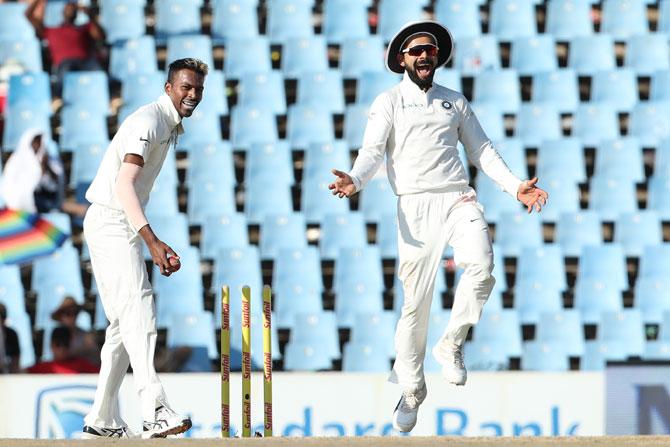 India captain Virat Kohli celebrates as Hardik Pandya knocks off the bails to run-out Vernon Philander