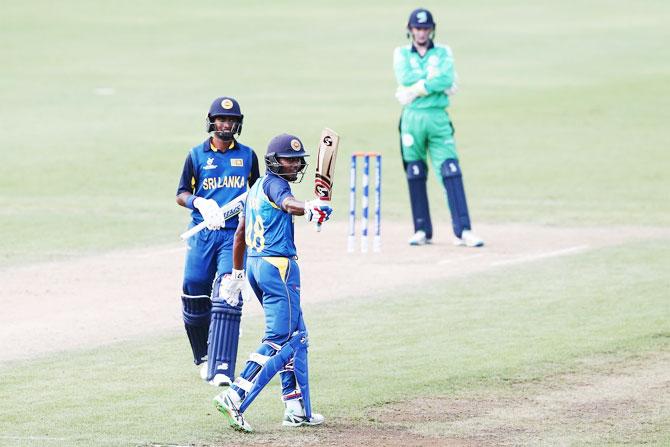 Dhananjaya Lakshan celebrates his century against Ireland on Sunday