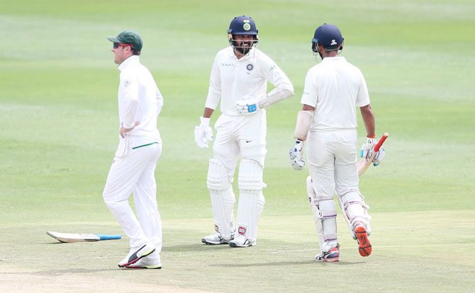 Murali Vijay reacts after being hit in the side by a Morne Morkel delivery