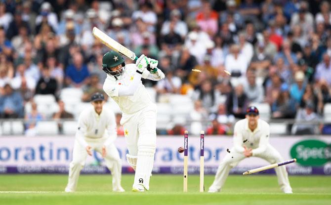 Pakistan batsman Azhar Ali is bowled by James Anderson