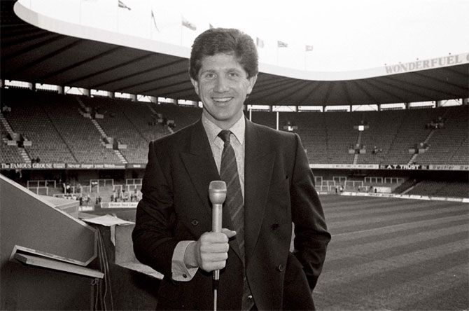 A young Alan Wilkins on assignment at the National Stadium in Cardiff