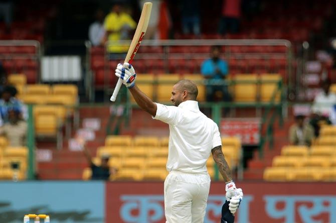 Shikhar Dhawan celebrates his century