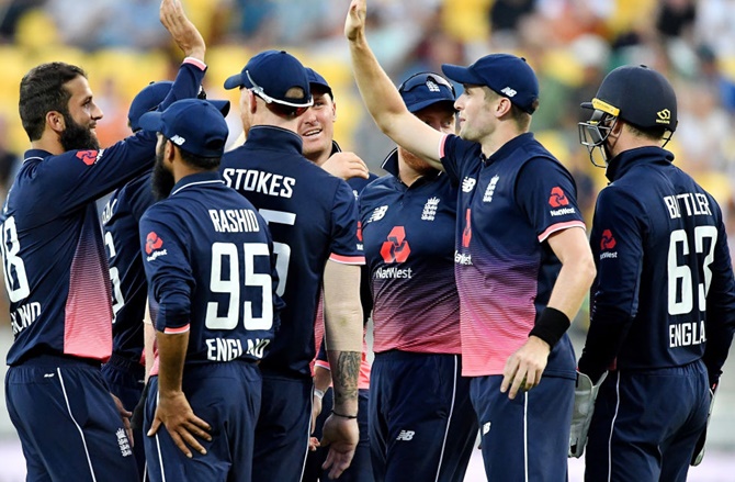 England players celebrate a wicket