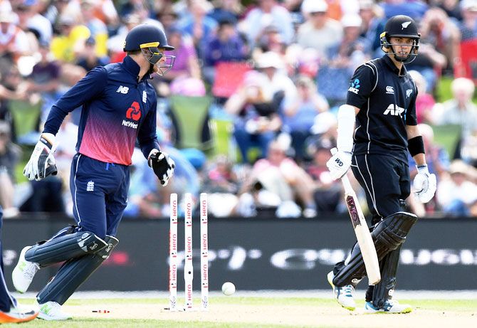New Zealand’s Mark Chapman reacts after being bowled as England’s wicketkeeper Jos Buttler celebrates during their one-day international match at Hagley Park in Christchurch on Saturday