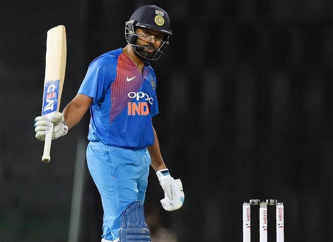 Rohit Sharma made a watchful start to his innings before completing his half-century