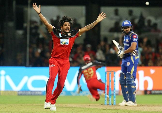 Umesh Yadav of the Royal Challengers Bangalore celebrates the wicket of Rohit Sharma