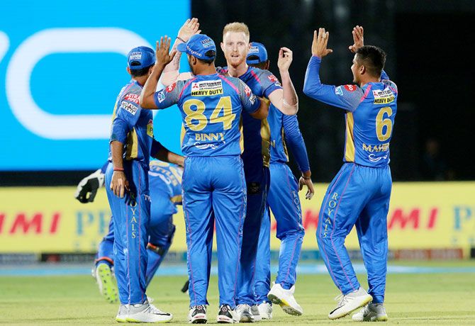 Ben Stokes celebrates with teamates on picking the wicket of Manoj Tiwary 
