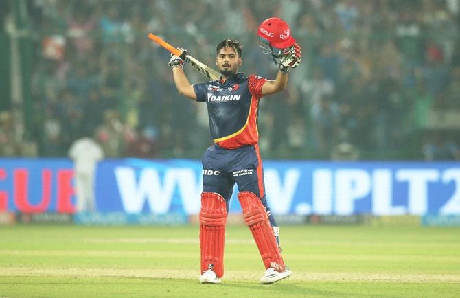 Rishabh Pant celebrates on completing his maiden IPL century