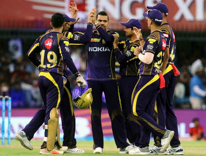 KKR players celebrate a wicket