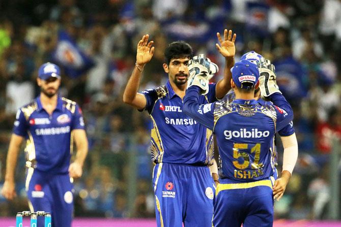 Mumbai Indians' Jasprit Bumrah celebrates the wicket of KXIP's Marcus Stoinis