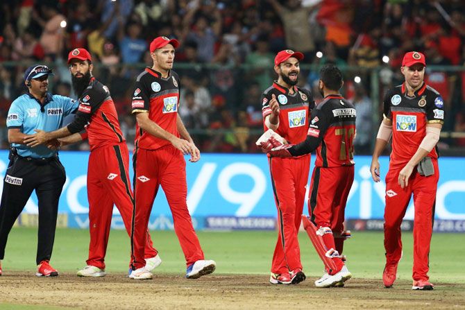 Royal Challengers Bangalore players celebrate after defeating Sunrisers Hyderabad