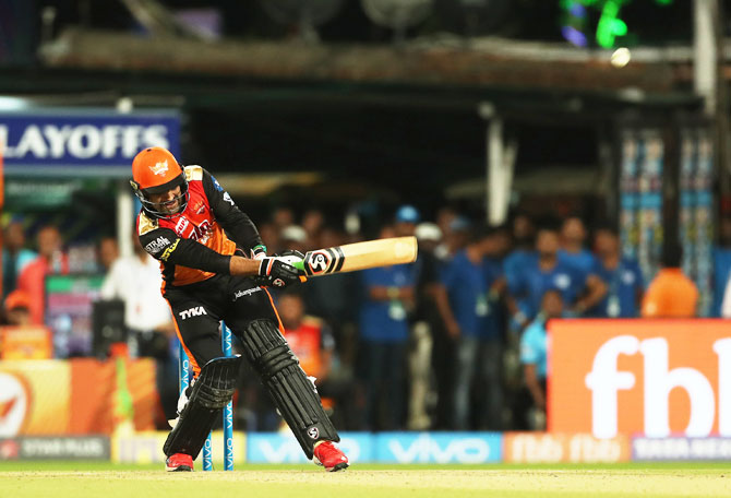 Rashid Khan plays an innovative shot during his innings of 34 off 10 balls