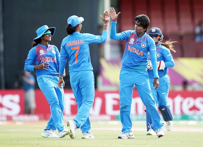 India players celebrate after dismissing a New Zealand batsman during their World T20 opener in Guyana on Friday