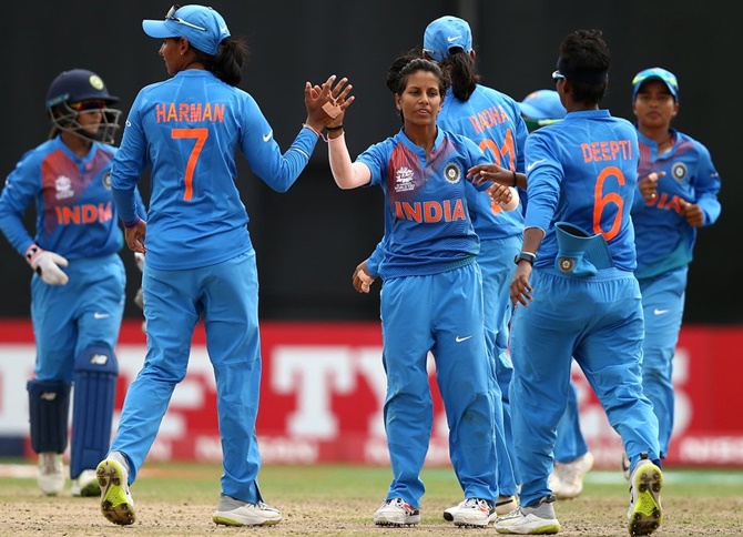 India's players celebrate a dismissal