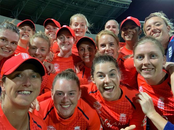 The England women's cricket team celebrate after their victor over India