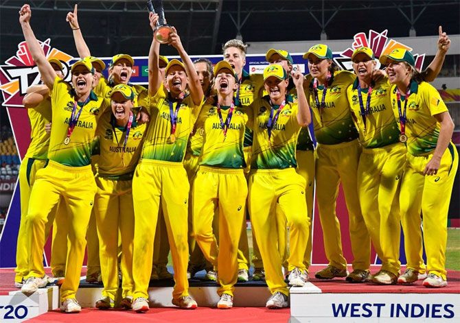 The Australian women's team celebrate after winning the Women's World T20 title on Saturday