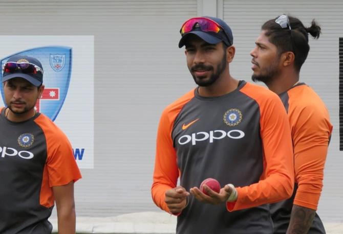 Bowling stars Kuldeep Yadav, Jasprit Bumrah and Umesh Yadav in the nets. Photograph: BCCI/Twitter