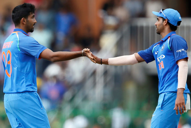 Jasprit Bumrah, left, and Bhuvneshwar Kumar lead India's best bowling attack in a World Cup. Photograph: Dinuka Liyanawatte/Reuters