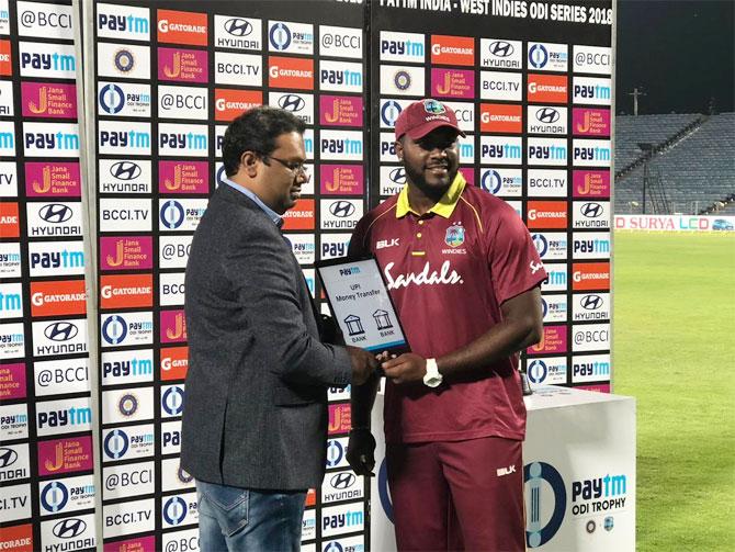 Ashley Nurse receives the Man-of-the-match for his blazing 50 at the back end of the West Indies innings