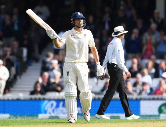 Alastair Cook acknowledges the crowd on completing his half-century