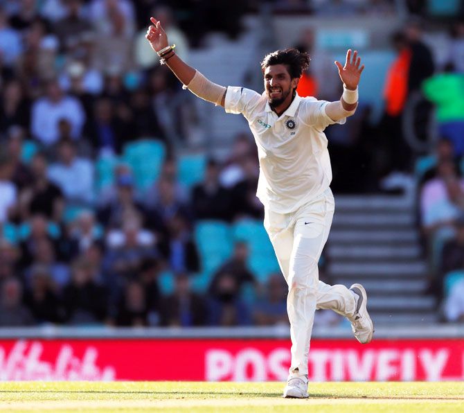India's Ishant Sharma celebrates the wicket of England's Moeen Ali