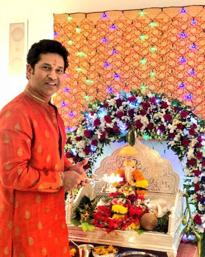 Former India captain Sachin Tendulkar performs Ganesh aarti at his residence