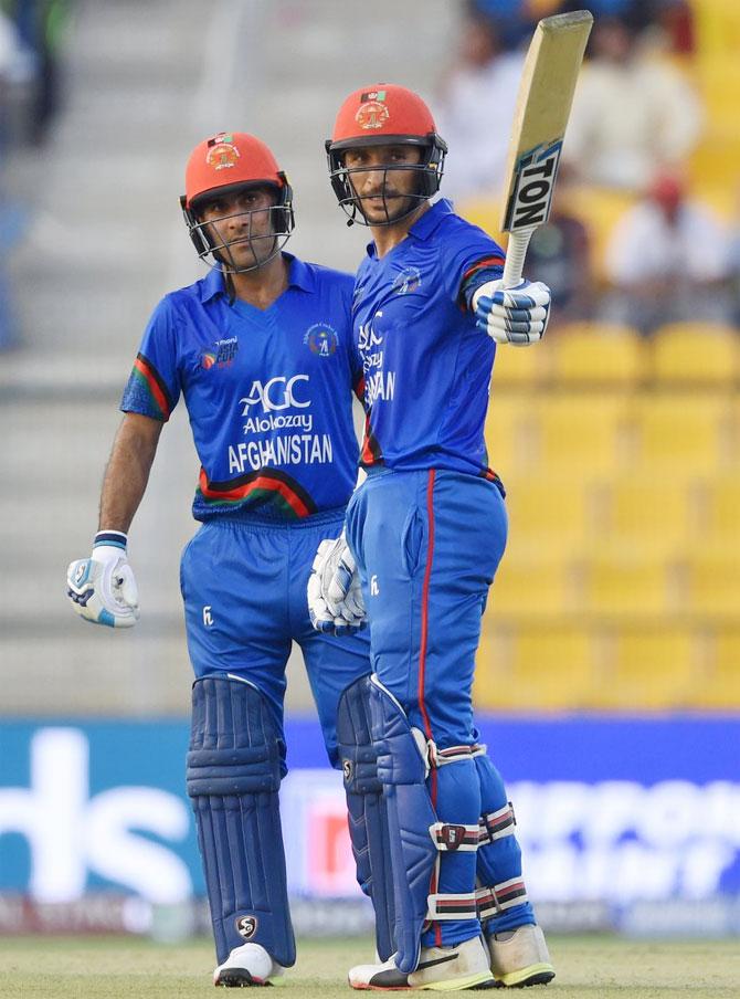 Afghanistan's Rahmat Shah celebrates on completing his half-century