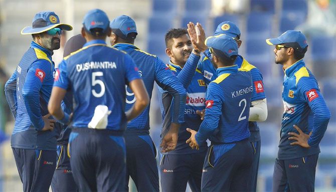 Sri Lanka players celebrate an Afghanistan wicket
