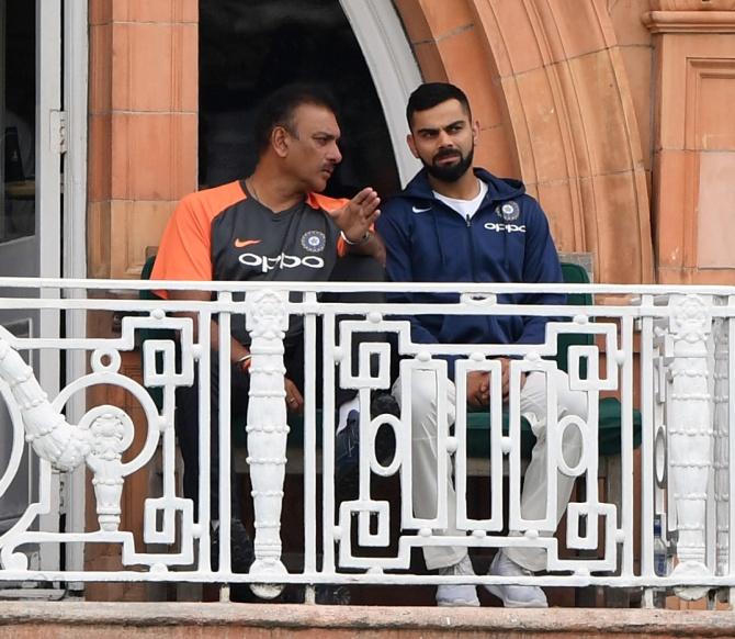 Virat Kohli with coach Ravi Shastri