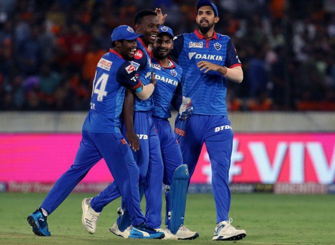 Delhi Capitals' players celebrate a wicket