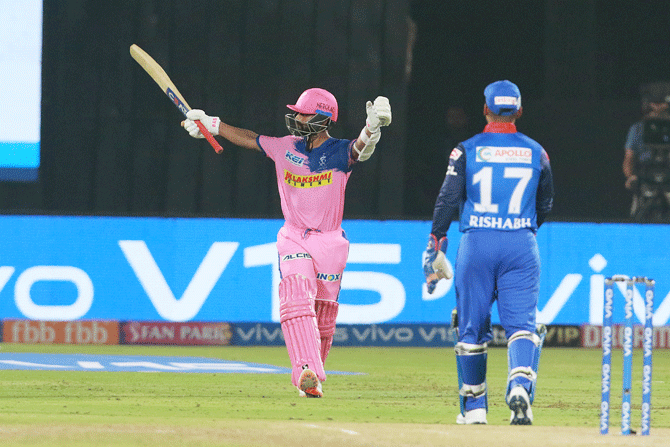 Ajinkya Rahane acknowledges the crowd after getting to his century -- only his second in the IPL