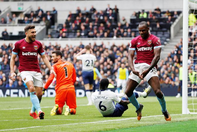 West Ham's Michail Antonio (right) celebrates scoring their first goal against Tottenham Hotspur at Tottenham Hotspur Stadium, London, on Saturday