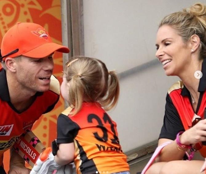 David Warner with daughter Ivy Mae and wife Candice