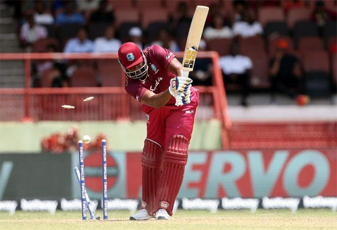 Kieron Pollard is bowled by Navdeep Saini