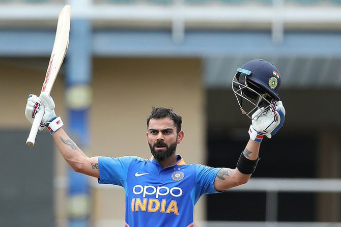 Virat Kohli celebrates on completing his 42nd ODI century