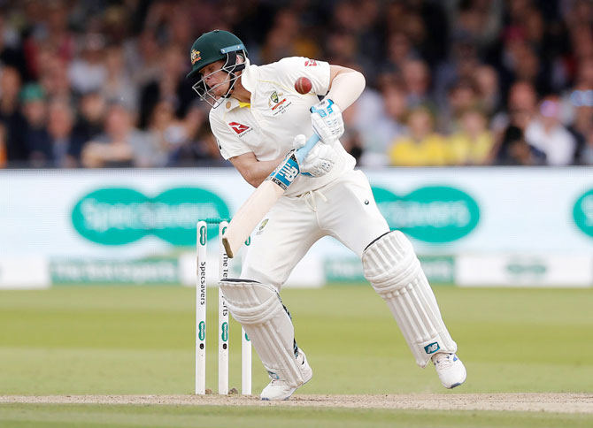 Australia's Steve Smith is struck by a delivery from England's Jofra Archer on Day 4 of the 2nd Ashes Test at Lord's Cricket Ground in London on Sunday