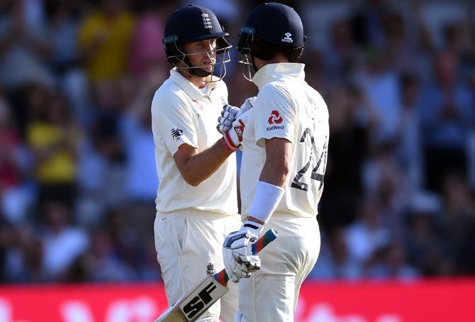 PHOTOS: Captain Root Keeps England's Hopes Alive - Rediff Cricket