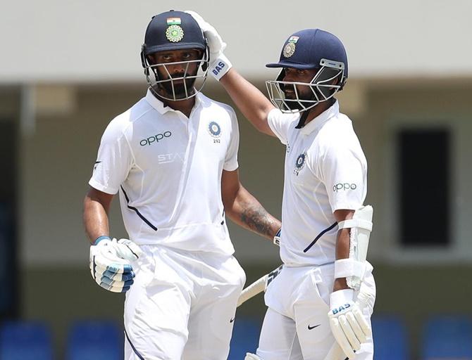 Hanuma Vihari is congratulated by Ajinkya Vihari after completing his fifty